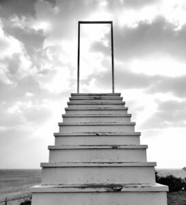 Photo by Wander Me: https://www.pexels.com/photo/black-and-white-picture-of-steps-leading-to-nowhere-on-the-beach-17524070/